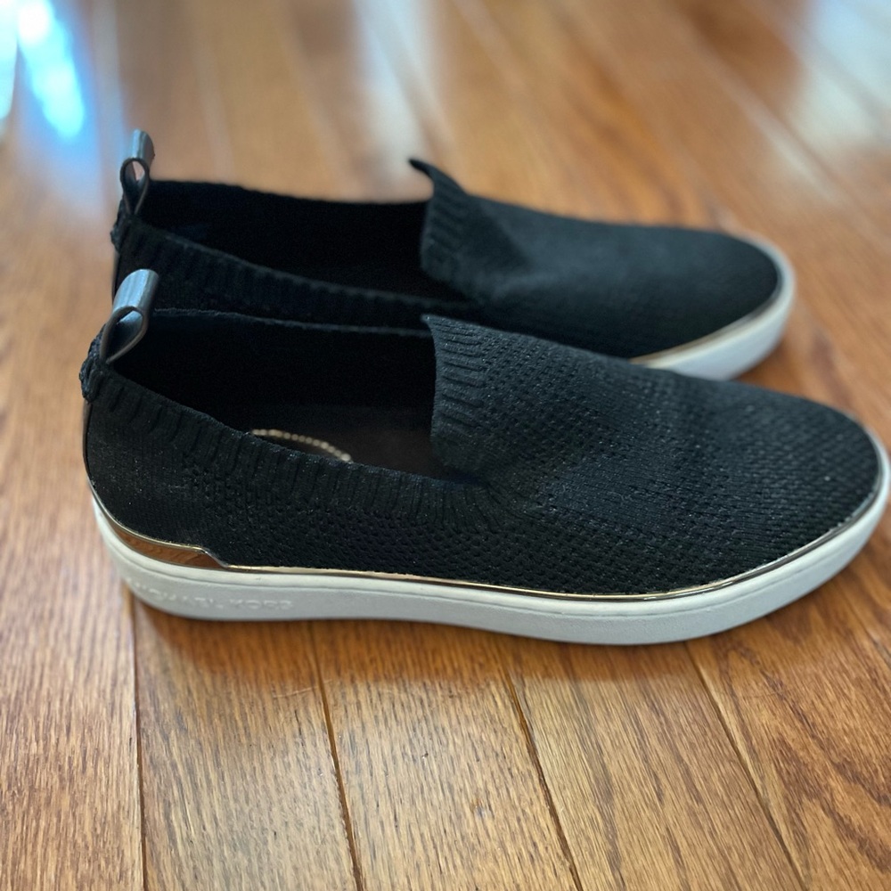 Michael Kors black slip on sneakers